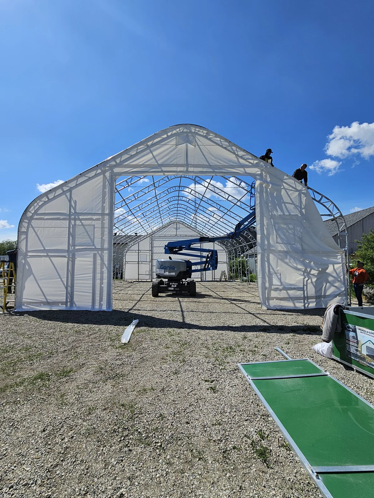 White endwall fabric in place while the roof frame remains open